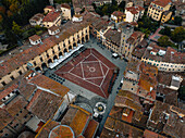 Aerial view of historic old town with beautiful terracotta rooftops and charming square,Arezzo,Italy