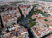 Aerial view of beautiful historic architecture and residential buildings amidst greenery in Arganzuela,Madrid,Spain