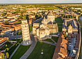Aerial view of leaning tower of Pisa at sunrise in Italy