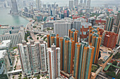 Aerial view of colourful apartment buildings near the ocean,Hong Kong island