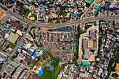 Aerial view of Mohakhali,a bus terminal station and parking lot surrounded with residential district in Dhaka,Bangladesh