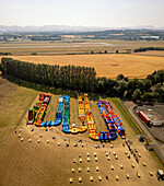 Aerial view of colorful adventure park with inflatable obstacles in field,Conifox Adventure Park,Edinburgh,Scotland