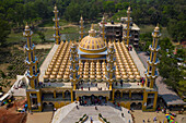 Aerial view of Gombuj Masjid islamic mosque along Jhinai river in Gopalpur township,Dhaka state,Bangladesh