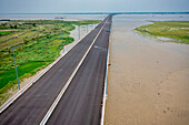 Aerial view of Padma bridge,over the padma river by day in perspective,Shibchar,Dhaka,Bangladesh