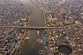 Aerial view of Dhaka skyline city centre along Buriganga river with Gol Talab artificial lake in foreground,Dhaka,Bangladesh
