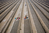 Dhamrai,Bangladesh - 26 March 2019: Aerial view of a few people working in a brick factory,Dhaka province,Bangladesh