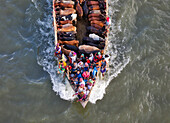 Aerial view of cattle squeezed on a boat crossing the river in Narayanganj,Bangladesh