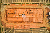Aerial view of a brick factory with a small furnace chimney along Buriganga river,Keraniganj,Dhaka province,Bangladesh