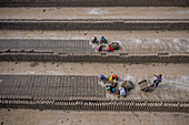 Dhamrai,Bangladesh - 26 March 2019: Aerial view of a few people working in a brick factory,Dhaka province,Bangladesh