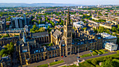 Aerial view of University of Glasgow campus with historic buildings,greenery,and towers,Glasgow,Scotland