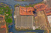 Aerial view of a brick factory from above,people working arranging the bricks near Keraniganj township,Dhaka province,Bangladesh