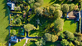 Aerial view of Chesters village with green countryside and natural perspective,Southdean Cemetery,Hawick,Scotland,United Kingdom