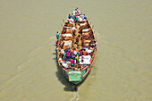 Aerial view of cattle squeezed on a boat crossing the river in Narayanganj,Bangladesh