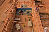 Keraniganj,Bangladesh - 07 February 2020: Aerial view of people working in a brick factory,piling red bricks in Dhaka,Bangladesh