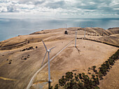 Aerial view of wind turbines on the hill at Starfish Hill Wind Farm along the coast facing St. Vincent Gulf in South Australia region,Australia
