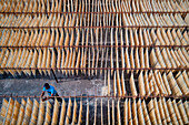 Barga,Bangladesh - 17 April 2022: Aerial view of People working on the production of typical natural fabric,Rajshahi