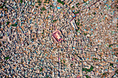 Aerial view of people celebrating the holy colour festival near the Shri And Baba Temple,Uttar Pradesh,India