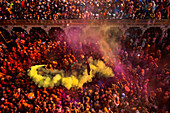 Nandgaon,India - 01 March 2023: Aerial view of people celebrating the holy colour festival at Shri And Baba Temple,Uttar Pradesh,India