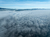 Aerial view of serene clouds floating in a beautiful blue sky,Uerikon,Switzerland