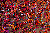 Nandgaon,India - 01 March 2023: Aerial view of people celebrating the holy colour festival at Shri And Baba Temple,Uttar Pradesh,India