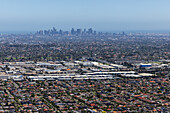 Aerial view of sprawling cityscape with modern buildings and residential areas,Thomastown,Australia
