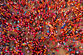 Nandgaon,India - 01 March 2023: Aerial view of people celebrating the holy colour festival at Shri And Baba Temple,Uttar Pradesh,India