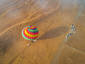 Aerial view of an hot-air-balloon landing in the Murqquab desert in Dubai,U.A.E
