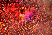 Nandgaon,India - 01 March 2023: Aerial view of people celebrating the holy colour festival at Shri And Baba Temple,Uttar Pradesh,India