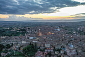 Aerial view of Siena old town with Piazza del Campo main square at sunset,Tuscany,Italy