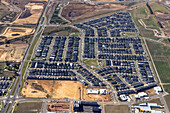 Aerial view of modern residential suburb with planned community and infrastructure,Clyde North,Australia