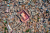 Aerial view of people celebrating the holy colour festival near the Shri And Baba Temple,Uttar Pradesh,India