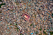 Aerial view of people celebrating the holy colour festival near the Shri And Baba Temple,Uttar Pradesh,India