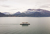 Aerial view of single ferry boat crossing Lago di Como,Cadenabbia,Italy