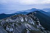 Aerial view of a old radar station on the mountain peak at the border between Croatia and Bosnia and Herzegovina next to the Zeljava Aibase