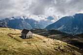 Aerial view of a lonely House in the mountains north of the valley Valbona,Gemeinde Tropoja,Albania