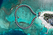 Aerial view of touristic bungalow of a luxury resort floating in the Ocean on Atoll Alifu Dhaalu,Alif Alif,Maldives