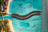 Aerial view of touristic bungalow from a luxury resort on Kaafu Atoll near Malé,Maldives