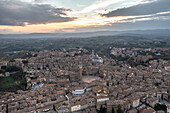 Aerial view of Siena old town with Piazza del Campo main square at sunset,Tuscany,Italy