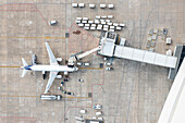 Canelones,Uruguay - 08 June 2023: Aerial view of Aeropuerto de Carrasco with airplanes on the runway and terminal,Canelones,Uruguay