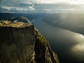 Aerial view of a man standing at Preikestolen,Fossmork,Norway