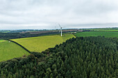 Aerial view of a wind turbine in countryside near Bodmin township,Cornwall,England