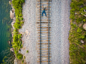 Concept aerial view man escalating rail tracks,Wisconsin,USA