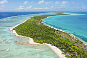 Aerial view of Farquhar atoll,looking south with the Indian Ocean to the left and the lagoon to the right. Seychelles