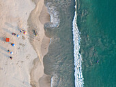Aerial view of La Ropa Beach with beautiful sandy shoreline and vibrant umbrellas,Zihuatanejo,Mexico