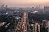Aerial view of busy,crowded Mumbai city skyline at sunset with dense skyscrapers and modern infrastructure,Mumbai Metropolitan Region,India
