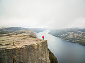 Aerial view of a man standing at Preikestolen,Fossmork,Norway