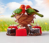 Chocolate pralines with sweet bird decoration