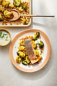 Oven-baked salmon with Indian vegetables