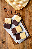 Sandwich ice cream with dark chocolate coating