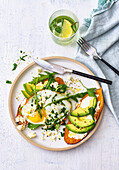 Sweet potato toast with fried egg and avocado